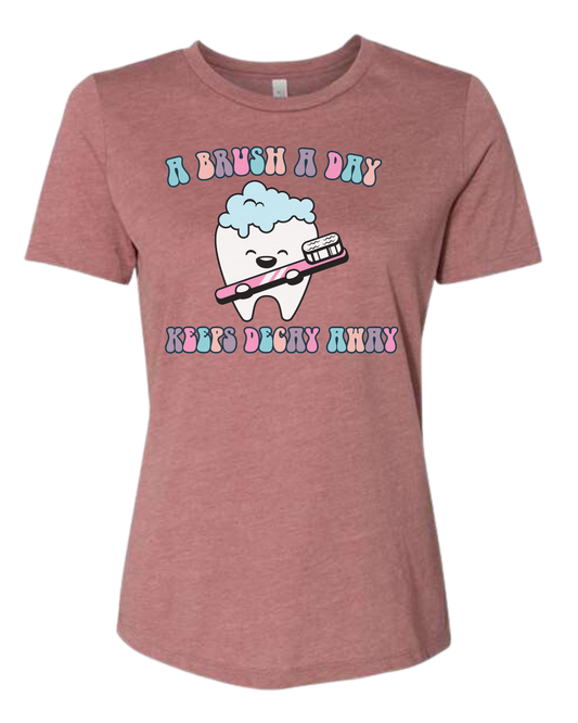 "A Brush a Day, keeps Decay Away" cute tooth holding toothbrush Women's fit premium crewneck tee Mauve Pink