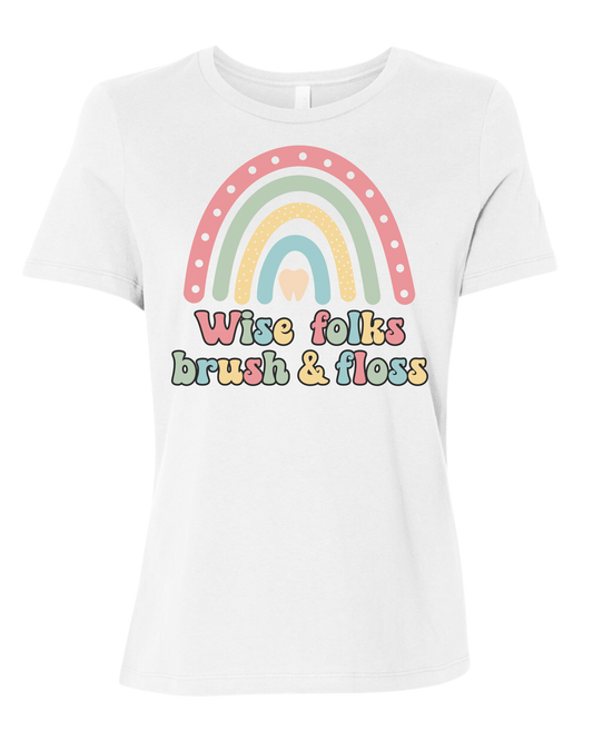"Wise Folks, Brush, and Floss" Rainbow graphic Women's fit premium crewneck tee White